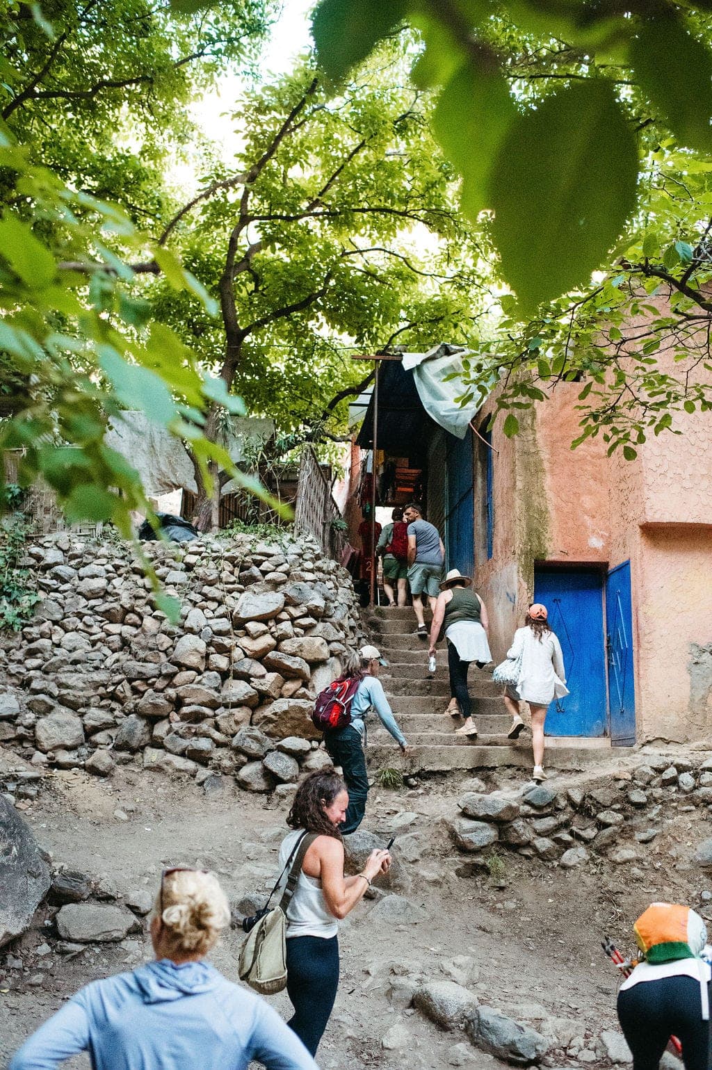 Stone stairs climbing through a village